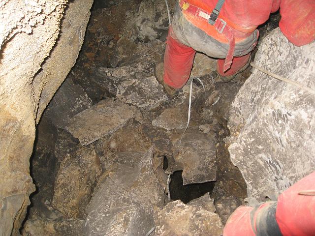 img_2744.jpg - The floor of the passage was actually a loose pile of breakdown in the ceiling of a room below.  It was actually more stable then it looked.