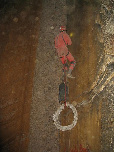 img_2749.jpg - Chris climbing up the 70 foot pit.